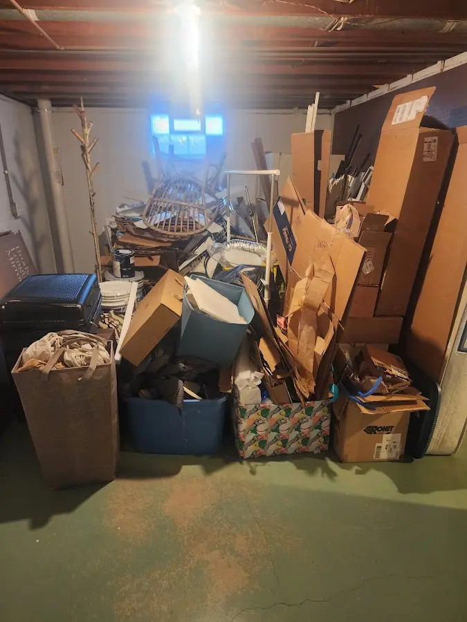 Roll-off dumpster container at job site for 20 Yard Dumpster Rental in Woodlawn Beach